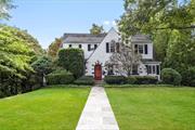 Located on a quiet street in sought-after Scarsdale neighborhood, 56 Woods Lane offers the perfect blend of character & convenience. Walk to NYC train, village shops, restaurants, parks, Edgewood Elementary & Scarsdale HS. Free bus to Scarsdale MS.The home features 4 bedrms, plus an office, 2 full bathrms & a powder rm. A nicely renovated kitchen opens to the rear deck overlooking a flat, bucolic backyardâ€”serene & private, perfect for outdoor dining & play. The interior showcases lovely hardwood floors, character moldings & arched front door. Off the kitchen is a private home office (potential 5th bedrm). On Level 2, there is a spacious primary bedrm w/ensuite bath & 5 closets, plus 3 add&rsquo;l bedrms & hall bath. High ceilings & a large, walk-out, unfinished basement storage area offer great potential for future recreation rm &/or home gym. Add&rsquo;l amenities incl 2-car attached garage, gas heat, central air, EV charger, versatile floor plan, sunny interior & fab location!