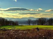 Where the road ends. This 26 acre parcel runs adjacent to the Hudson, with majestic views up and down the river and to the Catskill Mountains beyond. Part of a 205 acre property, one of the largest available on the Hudson River, this rare, undeveloped slice of heaven is available for the first time in over twenty years. Watch the barges pass by on their way to New York, witness the storms blow over the mountain range, see the glow of the lighthouse in the distance as dusk sets in and the eagles fly over the landscape. An incredible, once in a lifetime opportunity abutting large swaths of forever wild land to the south and east. Just 10m to Amtrak and all that the vibrant city of Hudson has to offer from its farm-to-table restaurants, burgeoning hotel scene and antique troves. 2.5h to NYC.