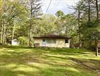 Looking for a country cottage or that great little cozy getaway? Built in 1960 this original 624 SF Cottage/bungalow with a 120 SF covered porch is now is listed to sell to a new owner. Located in the charming hamlet of Glen Spey, close to the Delaware River for recreation, Circle Park for fun, the Homestead and Eldred schools, conveniences and only 20 minutes to commuter trains and buses. This Home features 3 cozy bedrooms, living room with dining area, kitchen and bath. Just imagine screening in this covered porch for additional 3 season living space. A great property on 2 lots totaling nearly 3 acres with lawn, hardwood and pine trees,  2 car garage parking included a detached one car garage and one car garage under the home. 744 total square feet with covered porch. Only 2 Hours NYC.