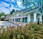 Imagine being able to take advantage of living in a charming four bedroom, two bath home, and having the ability to walk out your front door, onto the walkway and into your own gorgeous commercial space with so many possibilities! This mixed-use commercial/residential property is located in the Historic Village of Hyde Park. The two-story home (1869sf) was built in 1928 and has the charm of yesteryear: appointed with beautiful moldings, gleaming wood floors, arched doorways, a wood mantel/brick fireplace, three bedrooms and a primary suite with a full bath. Updates include kitchen and baths, lighting, furnace, and basement drain lines. This would make a perfect live/work environment with all of the conveniences. The commercial building was constructed in 2009 (-1750sf). It was architecturally designed by a local firm, and built by Mid Hudson Construction Management. The design and finish work are impeccable; features include vaulted ceilings, private offices (6), open spaces (conference/showroom/dining/retail) designer lighting, wood floors, a large kitchen/task center, three bathrooms, a utility room and a control room. The space lends itself to so many possible uses: professional/medical office space, retail/specialty stores, Salon/Spa, Conference center, restaurant/bakery, Gym/Yoga/Health Center, Air BNB, Bed and Breakfast/Inn, Daycare Center, rentals (office/co-work space solutions/pay as you go), event space for small gatherings (weddings, birthdays, small events), catering, residential rental conversion, art studios . . . the list goes onâ€”just get creative! In 2024, a Burnham high efficiency system and Heil natural gas direct vent furnace were installed to provide gas heat/hot water to both buildings. Three tank commercial septic system. Its location on Albany Post Road (Rt. 9) gives you perfect visibility! Close to National Historic sites (FDR Home/Vanderbilt Estate), tourist sites, restaurants, shopping, medical facilities, retail, library, post office, The Culinary Institute of America, Marist College, the Hudson River, and so much more! Additional Information: Amenities:Storage,
