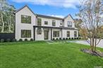 Just completed new construction - 7 bedrooms and 6 full baths. 5500 sf of Hamptons living on three levels located just 4 minutes from the heart of Southampton Village. Crafted with the finest materials and attention to detail by Matt Pantofel. Fresh and open floor plan with custom chef&rsquo;s kitchen, great room with linear gas FP and showcase bar and butler&rsquo;s passthrough to formal dining. A white oak paneled den, main floor bedroom suite and mudroom with a full pool cabana bath with radiant heated floors completes the first level. Ascend the stair tower to the expansive primary suite with linear gas fireplace, balcony and sun-drenched spa like bath with soaring ceiling and soaking tub. Three additional guest suites and laundry complete the upstairs along with an open media loft and balcony looking out over the lush property. The lower level boasts the full program: 2 bedrooms, a full bath, expansive rec room with FP and wet bar and gym. Out back a heated Gunite pool with shaded patio surround, outdoor kitchen, and mature, professional landscape package. A 2 car heated garage with expansive parking completes the offering. Modern Hamptons living with BJC Luxury Homes.