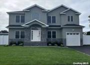 brand new construction 5 bedroom colonial , bedroom an full bath on first floor, huge kitchen with center island an all high end appliances master bath features big tub an oversized shower large den with gas fireplace separate laundry room on second floor this home has so many extras must see