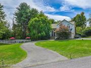 At the end of a private cul-de-sac in Lake Katrine, is this inviting 3 bedroom, 3 full bathroom home offering the perfect blend of serene country living and modern comfort. Just a short drive from NYC, this property is ideal for those seeking a peaceful getaway or a permanent residence in the Catskills. The airy, open-concept living space is adorned with wood-paneled ceilings and a stone fireplace, creating a warm and inviting atmosphere. The gourmet eat-in kitchen boasts freshly painted cabinets, sleek granite countertops, and a new gas stove with a built-in air fryer - perfect for the culinary enthusiast. Enjoy a spacious primary bedroom on the main floor, featuring a newly renovated en-suite bathroom. Also on the main floor, an oversized laundry room adds convenience to your daily routine. The interior has been freshly painted, a new HVAC system ensures year-round comfort, and the refinished staircase and poured cement patio enhance both indoor and outdoor living spaces. Set on a lush, manicured lawn with mature trees, this property offers privacy and space you&rsquo;ll appreciate. Relax by the heated in-ground pool, entertain on the patio, or simply soak in the natural beauty surrounding you. A circular driveway leads to the two-car garage, providing ample parking for residents and visitors alike. The full basement with walk-out access offers additional storage or the potential for future living space. New gutters with covers make home maintenance a breeze. Located in the heart of the Hudson Valley, this home is perfectly positioned for both tranquility and convenience. You&rsquo;re just minutes from the vibrant city of Kingston, the artistic haven of Woodstock, the outdoor paradise of Phoenicia, and the charming town of Stone Ridge. For those commuting or visiting New York City, Manhattan is only a two-hour drive away. Whether you&rsquo;re searching for a weekend retreat or a full-time residence, this turnkey home provides the perfect escape from city life without sacrificing modern amenities. Experience the best of both worlds - country charm and contemporary living - in this Catskills gem.