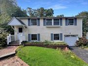 Beautiful High Ranch located in East Setauket. The lower level features a brand new updated kitchen, dining room, den, bathroom, access to garage with laundry. The upstairs features a living room, bathroom, primary bedroom and 2 additional bedrooms this house is a must see.