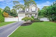 Welcome to this lovely colonial in the highly coveted Holiday Beach section of Center Moriches! A block from the picturesque Old Neck Creek, Forge River, and the Bay! Built in 2000, this beautiful 3-bedroom, 2.5-bath home features vaulted ceilings that enhance its spaciousness, along with a modern kitchen boasting quartz countertops, stainless steel appliances, a large pantry, and beautiful moldings. The master bedroom has a generous walk-in closet. Featuring beautiful radiant floors in the kitchen and 2nd floor bath, hi hats, 1st floor laundry, hardwood floors, and more! Enjoy the comfort of new central air conditioning and a full finished basement featuring a cozy den and an additional full bath, plus a convenient outside entrance. Set on a .22-acre lot, this property also includes an attached 1-car garage, in-ground sprinklers, and a meticulously landscaped and fenced yard with a Belgian block-lined driveway. A must see! This home won&rsquo;t last!