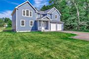 59 Gibbs Pond Rd, Nesconset  a brand new 4-bedroom, 2.5-bath Colonial, offering 3, 000 square feet of modern living on a spacious 0.59-acre lot. Priced at $979, 000, this home has everything you need for comfort and style. The first floor features 9-foot ceilings, a cozy living room with a fireplace, and an open dining area. The kitchen comes equipped with stainless steel appliances including a dishwasher, oven, and refrigerator. Upstairs, the oversized master suite has a large shower for your relaxation. Luxurious granite countertops in kitchen and all bathrooms. The home includes a full, unfinished basement with high ceilings and an outside entrance, giving you plenty of room to expand. You&rsquo;ll also enjoy a two-car attached garage and a private driveway. Heating is powered by natural gas with central air to keep you cool in the summer. Located in the Smithtown School District and close to local amenities, this home is ready for its first owners!