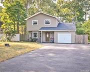 Welcome to this extremely well-maintained home, located in the naturally beautiful Pine Barrens neighborhood of Shirley! Boasting close proximity to South Haven Park, Smith Point County Park, Sunrise Hwy, the LIE and LIRR, this nicely updated, 3 (possible 4) bedroom, 2 bathroom colonial sits on a flat, mid-block 0.25 acre property. The oversized driveway and 1 car attached garage offer secure, ample parking and extra storage space. As you enter into the foyer, you&rsquo;ll immediately sense the pride of ownership, which sets the tone for this home&rsquo;s bright and airy interior. As you continue into the family room, you&rsquo;ll be impressed by the spacious, open feel and front bay window. Next, you find the eat-in kitchen, adorned with sliding glass doors, which lead out to the back porch and expansive fenced in back yard, the perfect space for entertaining outdoors. For added convenience, on the first floor, there is a full bathroom, nicely sized office and a laundry room. As you continue upstairs, you&rsquo;ll find the primary bedroom and 2 secondary bedrooms, all of which are generously sized for maximum comfort. An additional full bathroom is located in the main hallway upstairs. Additional features of this spacious home include tile floors in the kitchen and new wide-plank flooring throughout the rest of the home, which add warmth and character. A newer roof and vinyl siding ensure years of worry-free maintenance and ownership. This is the perfect, turnkey house to call home sweet home!