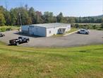 4500 sqft steel framed building with highway visibility on Route 17. Zoned IC ( industrial commercial ) building is currently used at office space/retail. Tenant pays $4500 a month on NNN lease. Current lease still has another 2 years remaining. Paved yard that fits 25 cars. Large commercial overhead door would make loading dock area or for future use for commercial vehicle storage. Additional Information: HeatingFuel:Oil Above Ground,