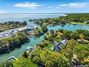 Experience the epitome of coastal country living in this newly constructed, quality craftsmanship waterfront home on James Creek, leading to Peconic Bay. With 80 feet of prime waterfront and approved plans for a Dock accommodating up to a 46&rsquo; boat, this home showcases a classic Hamptons Dutch roof line, Hardie cedar siding, Azek trim, along with an attached garage. The thoughtfully landscaped grounds of hydrangeas, boxwoods and seagrasses also feature a bluestone patio that surrounds a refreshing saltwater pool complete with an outdoor shower. Step inside to discover an inviting open floor plan, highlighted by generous 10-foot ceilings with crown molding, and warm 5-inch white oak floors.The gourmet kitchen with large butlers pantry boasts stunning quartz countertops, wood shaker cabinets and high end Italian Bertazzoni appliances, seamlessly flowing into the dining and living areas bathed in natural light from wall-to-wall windows and sliders. The living room, with its shiplap accent wall and gas fireplace, creates a cozy yet sophisticated atmosphere. The main level also includes a versatile formal dining room that can double as a home office, a Jr.en-suite, and a functional mudroom with laundry and a half bath, leading to the garage designed for the option of a car lift. Ascend the double wide staircase with wall moldings to the second level, where you will find a welcoming open den, a luxurious primary en-suite behind double doors with large sliders opening to a private deck overlooking the tranquil waterfront. There is a third en-suite bedroom, two additional bedrooms, another full bath and second laundry room complete this level. Surrounded by charming farm stands, exquisite wineries, beautiful beaches, and delightful restaurants, this stunning coastal home in Mattituck captures the coveted lifestyle of Long Island&rsquo;s East End., Additional information: Appearance:Perfect, Interior Features:Marble Bath