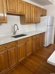 Ready for move-in! 4 bedroom apartment, hardwood floors throughout, huge kitchen! Create your dining room with this quartz countertops island ready for 6 stools. Open floor plan to a spacious living room. Each bedroom has a window. 3 blocks from subway station. Okay to share!