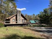 Discover the ultimate equestrian retreat nestled amidst nature&rsquo;s serenity  a captivating log home horse property offering unparalleled charm and functionality. This property comes equipped with a separate 2 bedroom, 1 bath guest house that can easily become a rental property for extra income. The remarkable estate features a spacious main house boasting 3 bedrooms, 3 baths, and a cozy family room warmed by a wood-burning fireplace. The open floor plan seamlessly connects the kitchen and living areas, complemented by modern amenities including mini split A/C for year-round comfort. For the avid equestrian, the property includes a 6-stall horse stable, a well-appointed tack room with radiant heat and full bathroom, and a sprawling outdoor area perfect for training. Practical amenities abound with a 30x30 garage featuring radiant heat flooring, and a roof recently replaced for worry-free maintenance. Additional outbuildings such as a pole barn, hay lean-to, and salt shed ensure ample storage for equipment and supplies. Embrace sustainable living with an outdoor wood-burning stove that efficiently heats the entire property and provides hot water during winter months. A whole house generator guarantees peace of mind, offering uninterrupted power supply also high-speed internet. Secluded amidst natural beauty, this estate promises tranquility and privacy, making it a rare find for those seeking a harmonious blend of rustic elegance and modern comfort. Don&rsquo;t miss this opportunity to own your dream equestrian property  schedule your private tour today and experience the allure of country living at its finest.