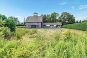 Iconic 1800s Barn with Modern Flair! This mid-1800s barn offers a rare opportunity to own a piece of North Fork&rsquo;s rich history. Set on nearly 2.5 acres the property is a private sanctuary, featuring a lush natural perimeter of Skip Laurel and towering 16&rsquo; Leyland hedges, offering serene views and complete privacy.   The barn is ready for expansion, presenting endless possibilities for customization.  Bordering protected land, the property guarantees open, unspoiled views that will remain for years to come. Located in the charming hamlet of Cutchogue, minutes from the region&rsquo;s best wineries, beaches, restaurants, and farmstands, this one of a kind home offers an idyllic escape. Don&rsquo;t miss your chance to own this timeless North Fork treasure.