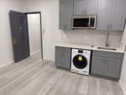 Two bedroom apartment for rent on the 2nd floor of a mixed-use building. Recently renovated. Open kitchen with washer/dryer. Convenient Northern Blvd location near shopping and transportation. Tenant is responsible for utilities.