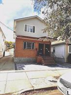 Stunning 2 family home, perfect for family seeking additional space or rental income. 6 bedroom 3 full bath. Fully finished basement with OSE. Huge driveway to accommodate 2 cars with a separate garage. 5 minutes to JFK. SELLING AS IS.