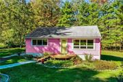 Welcome to this move-in-ready Mid-Century Ranch that exudes charm, character, and a cool retro vibe. With 1, 080 square feet of well designed space, this home feels surprisingly roomy and welcoming. The sunny open plan kitchen and living room is a standout, marrying the timeless flair of the 1950s with sleek updates, creating a space that&rsquo;s both vibrant and functional. The primary bedroom offers an unexpected touch of tranquility with its serene Asian-inspired aesthetic. Meanwhile, the newly renovated bathroom steals the show with a luxurious tiled shower and a bold red vanity that adds a pop of color and style. With central air, propane forced air heat, and on-demand hot water, every comfort has been considered. The home&rsquo;s newer roof, windows, and mechanicals ensure peace of mind, and the full basement, complete with a B-Dry system, provides an opportunity for extra storage or creative use. Set on a quiet, dead-end street, this 1.10-acre property feels like your own private retreat. Trees frame the yard, and a stream gently winds along the property, offering a soothing soundtrack to your daily life. It&rsquo;s the perfect balance of modern living and natural serenity. Schedule your showing today. P.S. Pink not your color, the aluminum siding is easily repainted :)