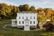 Introducing The Mayor&rsquo;s House. Built in 1836 by Oliver Wiswall, this stately Greek Revival home sits perched upon a hillside just outside of Hudson, NY in the coveted Mt Merino neighborhood with legendary views up the Hudson River. Pulling into the tree lined driveway and turning to the West, it&rsquo;s easy to see why this area inspired a generation of artists known as the Hudson River School of Painters, the first native school of painting in the United States. The solid brick home retains the grand feeling of its original prominence with dentil moldings, Doric & Ionic order columns and three stories of living space plus a full basement. The main floor boast high ceilings, beautiful restored moldings, 2 front sitting rooms with fireplaces and a large dining room. A striking 1980&rsquo;s addition is connected to the rear of the house with a 20+ foot vaulted ceiling and features a modern kitchen, pantry area with laundry, casual dining, sitting area, and access to a stone patio to enjoy the jaw dropping views. Upstairs find a primary ensuite, additional bed and ensuite bath. A third floor provides two additional bedrooms, a third full bath and den. Wood floors, big windows, tons of natural light and views throughout. A recent renovation includes all new heating and cooling, new roof, new septic tank, new kitchen and baths, new landscaping and driveway, new fixtures and finishes. The property is just under 40 acres of open lawn surrounding the home and woods in the back. Located under 2 miles to Warren Street in Hudson, convenient to the Rip Van Winkle Bridge, Amtrak Train, Olana and many of the Hudson Valley&rsquo;s most popular destinations.