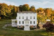 Introducing The Mayor&rsquo;s House. Built in 1836 by Oliver Wiswall, this stately Greek Revival home sits perched upon a hillside just outside of Hudson, NY in the coveted Mt Merino neighborhood with legendary views up the Hudson River. Pulling into the tree lined driveway and turning to the West, it&rsquo;s easy to see why this area inspired a generation of artists known as the Hudson River School of Painters, the first native school of painting in the United States. The solid brick home retains the grand feeling of its original prominence with dentil moldings, Doric & Ionic order columns and three stories of living space plus a full basement. The main floor boast high ceilings, beautiful restored moldings, 2 front sitting rooms with fireplaces and a large dining room. A striking 1980&rsquo;s addition is connected to the rear of the house with a 20+ foot vaulted ceiling and features a modern kitchen, pantry area with laundry, casual dining, sitting area, and access to a stone patio to enjoy the jaw dropping views. Upstairs find a primary ensuite, additional bed and ensuite bath. A third floor provides two additional bedrooms, a third full bath and den. Wood floors, big windows, tons of natural light and views throughout. A recent renovation includes all new heating and cooling, new roof, new septic tank, new kitchen and baths, new landscaping and driveway, new fixtures and finishes. The property is just under 40 acres of open lawn surrounding the home and woods in the back. Located under 2 miles to Warren Street in Hudson, convenient to the Rip Van Winkle Bridge, Amtrak Train, Olana and many of the Hudson Valley&rsquo;s most popular destinations.