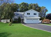 Welcome to a one of a kind contemporary colonial situated mid block in beautiful South Setauket Park. Home includes formal living room, dining room, eat in kitchen and powder room on first floor. Second floor include master bedroom with master bath, walk in closet. Three additional bedrooms including a very large bonus room and hall bathroom. Upgrades include recently installed new roof and skylights, new fence, renovated bathrooms, Upgraded electricity, new garage doors and gas fireplace. Covered patio and pond as well as inground sprinklers and fully fenced backyard.