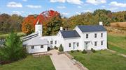 QUERENCIA&rsquo;&rsquo;- a rare offering This stunning sanctuary is an extraordinary example of a home meticulously restored with such care. Evident is the labor of love that went into renovating and restoring this rare original 1740/1840 farmhouse with an I.M. Pei disciple-designed magnificent modern addition. The location is totally private on its 8 acres surrounded by 600 acres of farmland on an incredibly private and quiet unspoiled country lane. Step into history to a home so welcoming and warm with magical light pouring into each room throughout the day. A joyous home where you can wander through gracious spaces to gather and intimate spaces to disappear and read, meditate or nap. There are 3 gracious en-suite bedrooms, including first floor primary with fireplace, two smaller bedrooms plus an additional full bath, one with large soaking tub overlooking the property, and the two primary suites with dressing rooms, plus ample closets and storage throughout the house. The romance of original details exude through the house from all the original and restored floors to the early beamed ceilings, the fireplaces, her soft curved stair to the countless windows.those Dutch doors and hard to find hardware saved through-out! There are 2 wood-burning fireplaces in the early era of the home and a Inglenook with massive fireplace in a silo-like structure in the fabulous addition housing the kitchen, seating and dining areas with sweeping views of the pool, a quintessential sweet weathered barn, a delightful red barn (endless possibilities) the ponds, fields of glorious wildflowers. It&rsquo;s truly thoughtful how all the modern additions and touches meld with the original structure and marry to this magical landscape. Dine alfresco in season with various stone terraces seating areas, swim and lounge by the pool or meditate among the wildflowers. In winter snow ski or just sit by a fire overlooking the magic. Each season displays Mother Nature&rsquo;s radiant yet peaceful beauty. A captivating year-round retreat offering both inspiration and privacy. Close to all conveniences and all the glorious bounty the Hudson Valley has to offer. Just 20 mins to Hudson and Amtrak, 10 minutes to Kinderhook. 15 minutes to Chatham. 30 minutes to the Berkshires and only 40 minutes to Albany International Airport. Come to a place where one feels at home, a favorite spot from where one can draw strength. The place where you are your most authentic self - Querencia&rsquo;&rsquo;