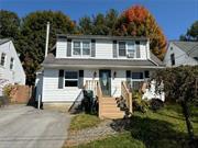 This 4-bedroom, 2-bath colonial, conveniently located next to Davidge Park, is now for sale. On the first floor, you&rsquo;ll find a large living room, a dining room, a spacious kitchen, and a bedroom with a full bath. The second floor features a large primary bedroom with an attached baby room or study, two more generously sized bedrooms, and another full bath. Outside, there is a lovely porch and a good-sized enclosed backyard, perfect for starting your own vegetable garden or enjoying playtime with your puppies. The house is just a block from Davidge Park, where you can enjoy the lake or take a peaceful walk.