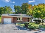 Elevate your lifestyle in this stunning, contemporary brick ranch in vibrant College Corners, Hartsdale. This meticulously renovated home is move-in ready! Recent upgrades include new windows, roof, siding, and a central air compressor (July 2024). The kitchen, dining room, and hallway were freshly painted in September 2024. Step inside to a spacious living room with a cozy wood-burning fireplace. The newly renovated kitchen features stainless steel appliances, a large island, granite countertops, and porcelain floors, plus an indoor grill oven for added fun! Flow into the grand dining room, ideal for entertaining, and open the sliding door to your outdoor patio and expansive backyard. With five bedrooms and two full bathrooms, this home has ample space. The finished lower level offers a recreation room, an extra bedroom or office, and another bathroom. Parking is easy with a one-car garage and driveway for four vehicles. Conveniently located near highways, restaurants, shopping, and schools, this luxurious home is ready for you! Schedule your private showing today!