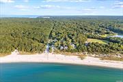 This extremely interesting multi-family compound on a one acre with 102&rsquo; of sandy beach features the most magical sunsets. With panoramic views across Gardiner&rsquo;s Bay to the North Fork and Connecticut. The combination of dwellings has a total of 7 bedrooms, 4.5 bathrooms, a two-car garage with lean-to, separate shed, heated lap pool, and brand-new hydro action I/A septic system. The primary waterfront house begins mid-level and is dominated by a common living and dining space with large windows and sliding glass doors for dynamite views across the outdoor deck. The kitchen, 1 bedroom and 1 full bath complete this level. The upper level includes the primary suite with private balcony, 1 bedroom, office landing area and rear deck overlooking the pool. The ground level apartment has separate walk out access and includes a full kitchen, dining area, living room, 2 bedrooms and 1 full bathroom. Driveway access to the primary residence is found off Flaggy Hole Road where there is also a two-car garage. A completely separate legal dwelling with access from Gallatin Lane includes 2 bedrooms, 1.5 bathrooms and a full basement. The ground floor has an open living concept with fireplace and powder room. The second floor has a generous bedroom with balcony and views, second bedroom, full bath and laundry. Separate storage shed. This property offers a rare experience on Gardiner&rsquo;s Bay., Additional information: Interior Features:Guest Quarters, Lr/Dr