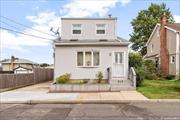 Discover the elegance of 312 Frederick Avenue in Floral Park. This charming vintage colonial offers a spacious formal dining room with sliders opening to a lovely deck, ideal for gatherings. This home is always bright because of the three skylights. The kitchen is equipped with gas cooking and a convenient pantry, and newer counter tops and appliances. This home also has an updated gas boiler and hot water heater. A first-floor powder room adds to the home&rsquo;s functionality, while a large crawl space provides ample storage. Enjoy the pavers, detached garage, the private yard. Everything has been freshly painted with a pale grey neutral tone. Roof was replaced in 2020.