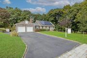 Welcome to your new home set along the coast of lovely Rocky Point. This expansive 5 bedroom New England Cape Cod is outfitted with ample storage, beautiful granite stone and cedar siding, a single layer architectural roof, a full finished basement, solar panels and much more! Take notice of the upgraded stainless appliances, new boiler, oil tank and hot water heater, the gray washed ground floor bathroom is appointed with beadboard and a new vanity. This home is set on a generous .51 acre lot, with 2 sheds, a large 2 car garage with attic storage, deck and patio, The fireplace at the front of the home creates the perfect ambiance for an autumn fire or take advantage of the local beaches and walking trails as well as the Long Island Pine Barren Region set just moments away. For days at home the finished basement with separate entrance at the rear of the garage creates the additional space we all need, with second set of laundry machines, additional utility area and office space or playroom with plenty of closets, recessed LED lighting, 3rd full bathroom, 200 AMP electrical service and full egress window. Home is being sold AS-IS.