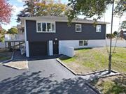 Beautifully newly renovated home in the quiet private Patchogue Shores! This three bedroom, two full bath, huge family or media room on the first floor does not need a single thing!! ALL RENOVATED Hardwood throughout the entire 2nd floor. New 2nd story wrap around Composite deck with lighting . All new Appliances updated electrical service. Electric heat w/ Private thermostats in each room for comfort . Amazing private community at Patchogue Shores. Security, private beach with Beach Rights and club house. Access to private marina. Close to Great S. Bay.