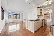 Oversized bright and sunny studio with unobstructed views of the Manhattan skyline and Gantry State Park. Two full walls of windows provide an abundance of light from direct Western and Southern exposure. The unit&rsquo;s soaring 11 foot ceilings and oversized windows are the largest in the building and unique to the 5th floor. The kitchen has been fully updated, with new tiling, cabinetry and appliances.