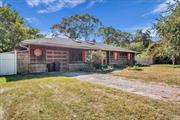 Move right into this unique Expanded Ranch filled with so much character and a lot to offer!! This home offers 3/4 bedrooms, 2 full bathrooms, and plenty of storage. When you first walk in you will notice the abundance of natural light provided by a great bay window and sky lights throughout. The living room and kitchen are a super inviting area for entertaining guest with a nice passthrough connecting the two. All three bedrooms are neatly located to the right along with the main bathroom. The master bedroom grants an optional access to the lovely backyard patio. The den/studio also offers plenty of room for entertaining guest or even creating an extra space for mom with a full private bathroom and its own access to the backyard. The backyard offers lots of privacy and a great space to entertain with potential of a pool house! Additionally, the garage offers plenty of storage and a small area currently being used as office space. The roof is just 5 years old!! The property is located on a quiet street. You will definitely feel as if you are vacationing with Smith Point Beach and Osprey Park just 10 minutes away! Don&rsquo;t miss the opportunity to call this place Home!