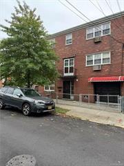 Grand two-family semi-detached brick home in the convenient Pelham Bay. The home is comprised of three large units plus cellar with rear private entry. The first-floor unit (kitchen and bath) are on the certificate of occupancy and designed to be used in conjunction with the second-floor unit, it is a two-bedroom, full bathroom, eat-in kitchen and large living room. Unit 2 and 3 are spacious three-bedroom, 2 full bath, eat-in-kitchen, formal dining room and large living room with added entertaining bar space. Unit 2 has a Juliet balcony.  The unfinished cellar adds an additional 1340 sq of space to expand and walkout to the backyard. This house features a one car attached garage. This home is being conveyed AS IS and is a perfect home to bring your ideas and make it your own. Great income potential. Short walk to transportation, shops, eateries and Florence Clolucci and Pelham Bay Parks.