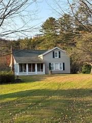 Beautiful riverfront setting with level open lot, 2 barns, gardens, and original home that has been in the family for decades.... Lovingly cared for but not made ultra-modern - this is the perfect get away from the hectic everyday life we all have.... Minutes to NYS Lands, trails, reservoirs, brewery and more.