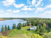 Arrive to nature&rsquo;s doorstep at 3 Big Lake Road, a beautifully renovated 4-bedroom, 3-bathroom lakeside cottage on 700 picturesque acres. Step inside to discover an airy floor plan featuring exquisite wood detailing, premium appliances and breathtaking views throughout. This home exudes an outdoor lifestyle like no other - unwind by the firepit at the water&rsquo;s edge or paddle through Big Pond, a 60-acre spring-fed lake. Explore a backyard with productive cranberry bogs, various large streams, expansive hardwoods and 6 miles of digitally marked trails, perfect for hiking and seasonal blueberry picking. Wildlife sightings infuse the landscape with enchantment, imbuing the property with a storybook aura and creating a sanctuary all its own. Embrace the beauty, tranquility, and adventure that await at this one-of-a-kind property in Huguenot.