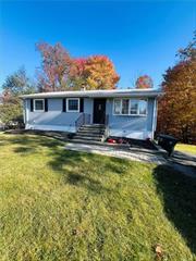 A must see home perfect for extended families or guests. Fully renovated 4-bedroom, 2 full bathroom ranch in a desirable neighborhood and situated on nearly half an acre. Updated eat-in kitchen with brand-new stainless-steel appliances, new granite counter-tops, island and ample cabinetry. Main level features three bedrooms with plenty of closet space, updated bathroom. Lower level features a 4th bedroom, fully renovated bathroom, SUMMER KITCHEN with brand new appliances, laundry with new Samsung washer and dryer, storage area, additional space with walkout to the backyard. Look no further, this gem features a spacious living room with lots of natural light, hardwood floors, a dining area with sliding doors that open onto a large deck with a spiral staircase and great views of the backyard-ideal for hosting gatherings! Schedule a appointment today!