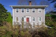 BREATHTAKING 1740 ESTATE - Historic Antique Colonial. Designated Landmark with wide board chestnut and pine floors, vintage millwork and three fireplaces. Front Parlor. Library. Great Room with original cooking fireplace, beehive oven and Dining Area with doors to wraparound terrace. Country Kitchen open to Family Room. Primary Suite. Three additional Bedrooms. Surrounded by over two incredible acres with ancient Sugar Maples, Apple and Weeping Cherry, specimen shrubs, berry garden, Heirloom Peonies, tiered lawns and raised flower gardens. Pool with spa. Two Barns.