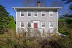 BREATHTAKING 1740 ESTATE - Historic Antique Colonial. Designated Landmark with wide board chestnut and pine floors, vintage millwork and three fireplaces. Front Parlor. Library. Great Room with original cooking fireplace, beehive oven and Dining Area with doors to wraparound terrace. Country Kitchen open to Family Room. Primary Suite. Three additional Bedrooms. Surrounded by over two incredible acres with ancient Sugar Maples, Apple and Weeping Cherry, specimen shrubs, berry garden, Heirloom Peonies, tiered lawns and raised flower gardens. Pool with spa. Two Barns.