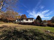 Ranch-style living, &#160;on 1.1 acres, with all of your necessities on one level plus additional finished walkout basement (1092sqft included in listing total). Hardwood floors in the living room, hall and all bedrooms. Eat-in-kitchen features a newer stainless steel oven/range and refrigerator. Slider off of the dining area to 18x22 deck overlooking the mature backyard. Finished, walkout basement with a spacious family room, second bathroom and two other rooms perfect for playroom, office or home gym. Supersized driveway suitable for many cars. 2-car detached garage with heater (as-is). Sought-after Minisink School District. Short drive to major highways&#160;and conveniences.