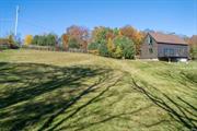 Sun-filled 2 story post and beam home looking for its next owner. A picturesque private road leads to this 2 bedroom, 2 bath charmer with hardwood floors, a woodstove for those chilly winter nights, a full walk out basement and many windows and glass doors for all day sunlight and views of nature. A deck overlooks the spacious backyard. With 4 acres of woods and a partly fenced open meadow the idea of animals or solar could be a possibility. Nestled in the quaint mountaintop hamlet of Cragsmoor, with its vast amount of protected land, over 5000 acres of Sam&rsquo;s Point Preserve to hike and enjoy makes this a perfect weekend get-away or full-time retreat. Under a 2-hour drive to the GW bridge and close to commuting, the dream of a healthy lifestyle of live , work, and play is attainable.