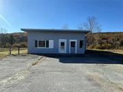 Bring your business here. Last use was a Deli, prior to that a auto sales. Many possibilities. Huge parking lot. Main building has two areas 20&rsquo; x 39&rsquo; which can convert back to a two bay garage. Attached side area perfect for an office of work space. Shed out back used for storage. Lots of visibility right on State Route 209 and 6 miles from State Route 17.