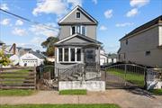 This is the Best three-bedroom, two-bathroom home in South Ozone Park. It has a large driveway for over 7 cars and a finished two-level garage. This home features hardwood floors, new siding, solar panels, chrome fencing, chrome doors front and back, large tarred driveway and side yard along with backyard.