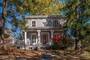 Circa 1867 Italianate Victorian featuring Ionic columns and classic wide projecting cornices with heavy brackets and ornate windows, porches, and doorways. Unspoiled by updates you will relish the grandeur and grace of the period, a treat for the purist at heart. Perched at the highest point on the property to capture the distant horizon and sweeping lawns ... if you are looking for a commanding presence, look here. Potential pool site and huge garden site. 2 story barn houses the 2 car garage, workshop and storage galore. 2 GUEST COTTAGES embellish the property (thoughtfully tucked away) the first was originally an art studio, updated in 1970 with soaring windows, kit, bth and loft br, the second is a charming 1-2br cottage. Convenient to park (loaded with amenities), shopping, schools, TSP and EZ Croton Harmon commute. This is truly a rare and precious find. Come see ... bring your heart and your vision.