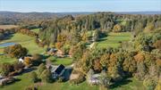 Welcome to a once-in-a-lifetime opportunity to own an exceptional equestrian estate sprawling over approximately 185 unrestricted acres in the heart of Millbrook hunt country. Originally built in 1865, this property has been meticulously expanded with a lavish addition spanning over 6000 sq ft, seamlessly blending antique charm with modern opulence. Enjoy miles of fenced pastures, riding trails, ponds, and panoramic views of the Catskill Mountains just minutes from the Village of Millbrook. Formerly owned by Margaret Carnegie, only child of Andrew Carnegie, this estate offers a piece of history and unmatched luxury. The main residence features a paneled library with fireplace, formal dining room with fireplace and a very generous living room with yet another fireplace and very high ceilings. Two staircases leading to separate wings and an elevator service both the primary suite and the finished basement. Designed by French architect, Atelier Choiseul, the exceptional stable boasts stables, paddocks, a tack room, lounge, and staff apartments. A hunter trial course adds to the recreational opportunities. Just minutes from Metro-North station, and a 90-minute commute to Manhattan, indulge in country living with access to prestigious activities like the Millbrook Hunt and Mashomack Polo. This rare offering provides unparalleled privacy, nestled in the serene countryside, yet with convenient access to urban amenities. Embrace luxury in the Hudson Valley&rsquo;s most coveted location.