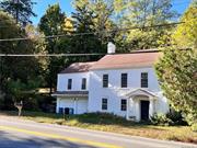 Historic registered home in the Town of Cornwall, admired through the years and tastefully renovated in 2024. Very close distance to the center of town as well as major commuter routes and a 10 minute drive to West Point Military Academy. Recently renovated & refinished hardwood floors throughout. 2 large bedrooms on the first floor with an attached jack and jill bath. Spacious & bright living room, kitchen with a separate eat-in nook and additional formal dining room. Third floor offers 2 bedrooms and another full bath and the lower level offers and additional family room and full bath with walk out to garage and front driveway. Additional driveway around back with a level private yard!