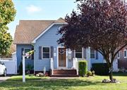 Welcome home to this charming three-bedroom, two-bath expanded cape located on a beautiful tree-lined street in the Rockville Centre School District. With a large fenced in yard and a spacious deck off the formal dining room, this home offers the perfect space for entertainment and privacy. As you walk in the front entryway, you will immediately be drawn to the large closet to your right. This home offers four closets alone on the first floor, as well as ample closet space in each sizable bedroom. The living room opens to the formal dining room which lets in beautiful natural light through the large sliding glass doors. The spacious kitchen is open to the den and towards the back of the home a perfect laundry/mudroom. This home was remodeled in 2011 with Andersen windows, each with wood blinds, new vinyl siding and roof, beautiful hardwood floors, central air, updated plumbing, insulation, electric and an outdoor sprinkler system. Look no further, 1175 Maple Avenue is move in ready and poised to make it your own!