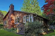 Mattituck. Charming North Fork Cottage. Cedar shingle with white shutters and trim, this 2 bedroom, 2 bath home is set on a beautifully landscaped .60-acre property. Light-filled, gracious, open floor plan. Authentic architectural details include a cross-beam living room ceiling, a brick wood-burning fireplace with a mantle and hearth, built-in cabinetry, and wood floors throughout. Lovely, bright office with wainscot walls overlooking the rear yard. Large kitchen with stainless steel appliances, gas range, subway tile backsplash, and butcher block counters open to the spacious dining area. Slider from the kitchen to a large patio, perfect for al fresco dining or hanging out. Updated main floor bath. Finished downstairs open recreation area with full bath. Bright and light. Additional boathouse with front porch and pergola. Lovely stone path between the house and boathouse. Seriously lovely property and structures suited for year-round or vacation living. Well maintained and waiting for you to move in, or affect your design and expansion ideas. Located in the Mattituck Park District. Deeded right of way to Howards Creek.? Boating, fishing, easy access to beaches, wineries, shopping, restaurants, breweries, farm stands, and all the North Fork amenities. This is a very special offering., Additional information: Appearance:excellent, Interior Features:Lr/Dr, Separate Hotwater Heater:yes