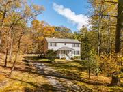 Welcome to The Magnolia, a serene mountainside retreat on 2.5 acres, just two hours from NYC and close to Saugerties, Woodstock, and Kingston. This light-filled home features modern design and has a history as a high-performing Airbnb. Inside, a spacious living room showcases treetop views, connecting seamlessly to a cozy lounge and updated kitchen with a large island for gathering. Upstairs, four well-appointed bedrooms include a primary suite with ensuite bath. The lower level adds entertainment value with a chic wet bar and lounge space. Outside, a large deck overlooks an above-ground pool, hot tub, and Bluestone fire pit, perfect for starry evenings. The Magnolia blends secluded charm with easy access to hiking, waterfalls, local farms, and moreâ€”your perfect retreat awaits. Additional Information: Amenities:Storage, HeatingFuel:Oil Above Ground,