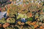 A rare opportunity awaits in the Three Village school district in East Setauket! Presenting for the first time ever on the market, this unique offering features 4.88 acres of prime East Setauket real estate. Located on Pond Path between Nesconset Highway and Saint Georges golf and country club, this property provides the perfect location and with a blend of both convenience and privacy. The sale includes two adjoining parcels: a charming 0.95-acre lot with a solid ranch-style home, and an expansive 3.93-acre lot with endless potential. The ranch has great bones with a spacious layout including an eat-in kitchen, dining room, living room, and also a family room with a fireplace and bar in the lower level. It also features a spacious primary bedroom with an Ensuite bathroom and 3 other good sized bedrooms. Original white oak floors add character throughout, includes central air and central vac, 3 heat zones, while ample storage and a large laundry room ensures practicality. Though some great updates have been made, this well taken care of home is in need of updating. This home offers a wonderful canvas to create your dream space. A must see in person to truly appreciate it. The additional 3.93 acres of land open up a world of possibilities-ideal for equestrians, builders, gardening enthusiasts, or anyone who cherishes nature and space. The property enjoys a serene setting, bordered by a property (which cannot develop within 50 feet) on one side and state-owned land on the other, ensuring both privacy and tranquility. The taxes on both lots combined are $20, 953. Don&rsquo;t miss this rare opportunity to own a versatile and expansive property in the beautiful community of East Setauket.