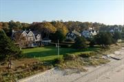 This meticulously restored Gilded Age shingle-style home presents a rare opportunity to own one of the few remaining large, turn-of-the-century North Fork summer estates. Spanning over 10, 000 sq. ft. on 140 feet of pristine bayfront with a private sandy beach, the main residence seamlessly blends period architecture with modern luxury. Every detail, down to the doorknobs and hardware, has been meticulously curated, resulting in a warm and classic home anchored in refinement and exceptional craftsmanship. Perfect for both grand entertaining and intimate gatherings, expansive living spaces feature soaring ceilings, multiple fireplaces, and thoughtful design moments throughout. Highlights on the first floor include a large waterside living room and dining room with charming fireplace alcoves, a sprawling chef&rsquo;s kitchen with breakfast room and handsome butler&rsquo;s pantry, a dedicated flower-cutting room with custom marble sink, and an enormous screened-in outdoor sitting porch complete with an outdoor dining room and kitchen. The second floor houses the large primary suite with an ensuite bath, extensive walk-in closets, a dressing room, and a cozy sitting room with an oversized fireplace. The balance of the second and third floors includes five additional waterside bedrooms, a library, an office, multiple wet bars, a laundry room, and 5 baths with steam showers and soaking tubs. Outside, lush perennial gardens and hedged lawns surround the property. A beautiful, private gunite pool sits on the waterside, offering a serene oasis with sweeping water views. A charming carriage house adds further versatility, featuring a great room, home theater, and gym. The estate also includes a historic icehouse, preserving its rich legacy. Whether sitting by the bay, hosting holidays, or enjoying movie nights in the theater, this extraordinary property promises a lifestyle of elegance and tranquility.