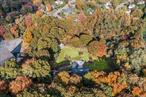 A rare opportunity awaits in the Three Village school district in East Setauket! Presenting for the first time ever on the market, this unique offering features 4.88 acres of prime East Setauket real estate. Located on Pond Path between Nesconset Highway and Saint Georges golf and country club, this property provides the perfect location and with a blend of both convenience and privacy. The sale includes two adjoining parcels: a charming 0.95-acre lot with a solid ranch-style home, and an expansive 3.93-acre lot with endless potential. The ranch has great bones with a spacious layout including an eat-in kitchen, dining room, living room, and also a family room with a fireplace and bar in the lower level. It also features a spacious primary bedroom with an Ensuite bathroom and 3 other good sized bedrooms. Original white oak floors add character throughout, includes central air and central vac, 3 heat zones, while ample storage and a large laundry room ensures practicality. Though some great updates have been made, this well taken care of home is in need of updating. This home offers a wonderful canvas to create your dream space. A must see in person to truly appreciate it. The additional 3.93 acres of land open up a world of possibilities-ideal for equestrians, builders, gardening enthusiasts, or anyone who cherishes nature and space. The property enjoys a serene setting, bordered by a property (which cannot develop within 50 feet) on one side and state-owned land on the other, ensuring both privacy and tranquility. Taxes on both lots combined are $20, 953. Don&rsquo;t miss this rare opportunity to own a versatile and expansive property in the beautiful community of East Setauket.
